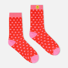 Load image into Gallery viewer, Red polka dot socks with pink accents on a white background