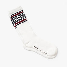 Load image into Gallery viewer, A single white crew sock with a striped navy and red cuff featuring the brand name 'PARLEZ' in white, shown on a clean white background.