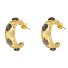 Load image into Gallery viewer, Gold hoop earrings with embedded stones on a white background