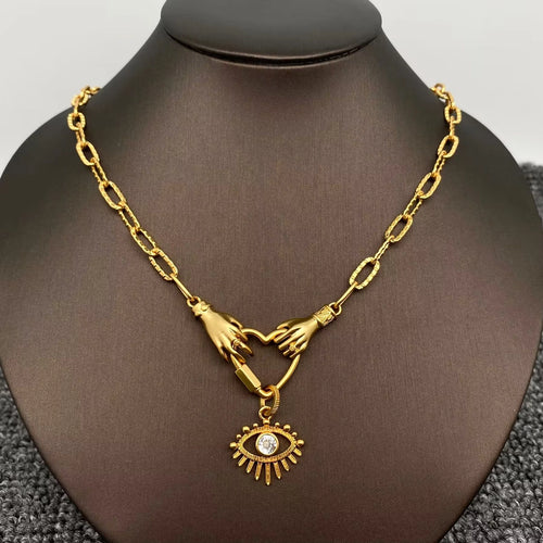 M. QUEENA | Holding The Evil Eye Heart Necklace | Gold Plated - LONDØNWORKS
