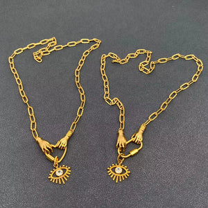 M. QUEENA | Holding The Evil Eye Heart Necklace | Gold Plated - LONDØNWORKS
