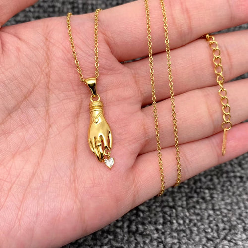 M. QUEENA | Heart Palm Charm Necklace | Gold Plated - LONDØNWORKS